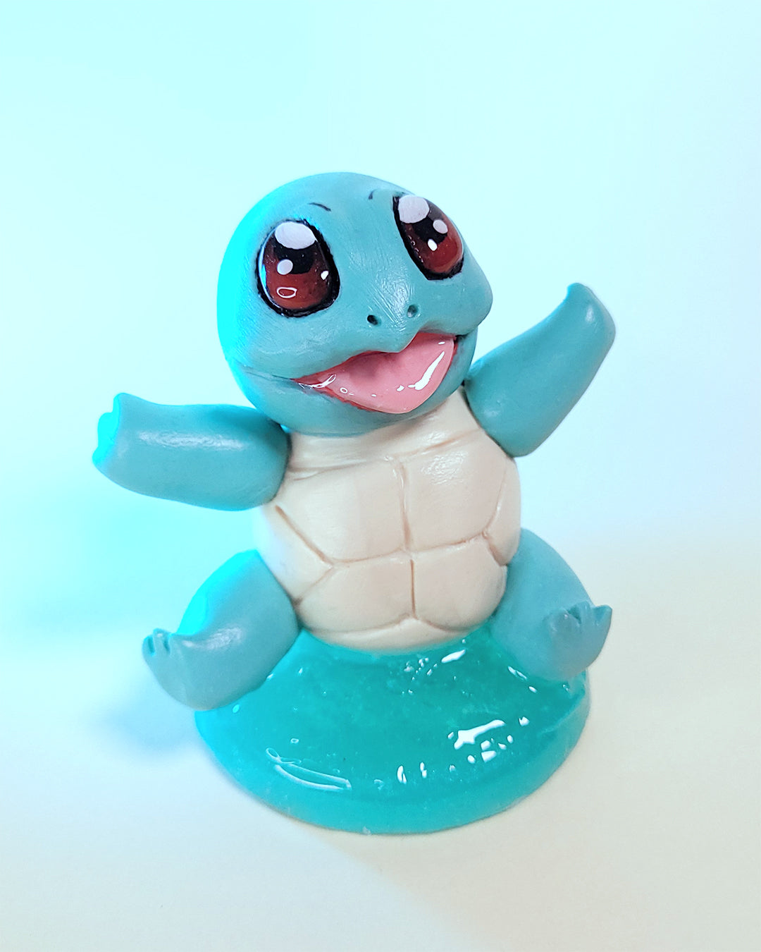 Mini figurine du Pokémon Carapuce, ressemblant à une tortue bleue turquoise