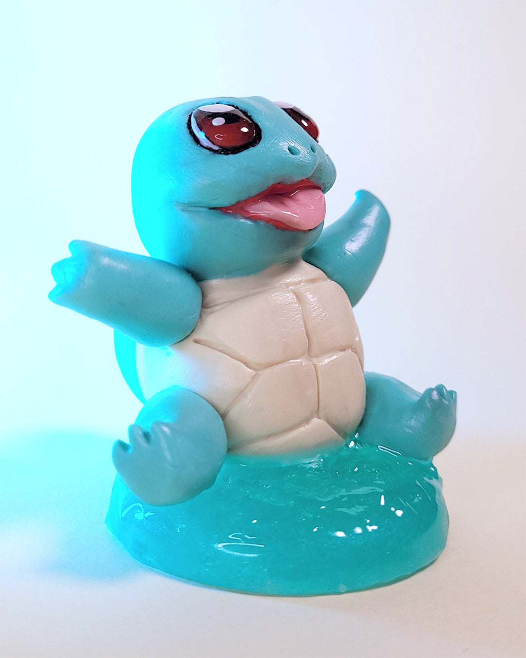 Mini figurine du Pokémon Carapuce, ressemblant à une tortue bleue turquoise