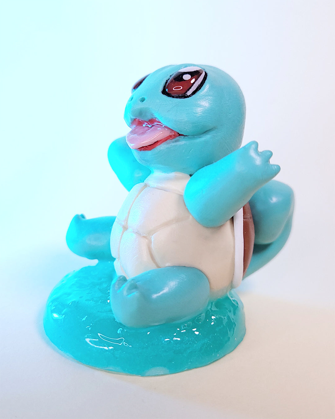 Mini figurine du Pokémon Carapuce, ressemblant à une tortue bleue turquoise