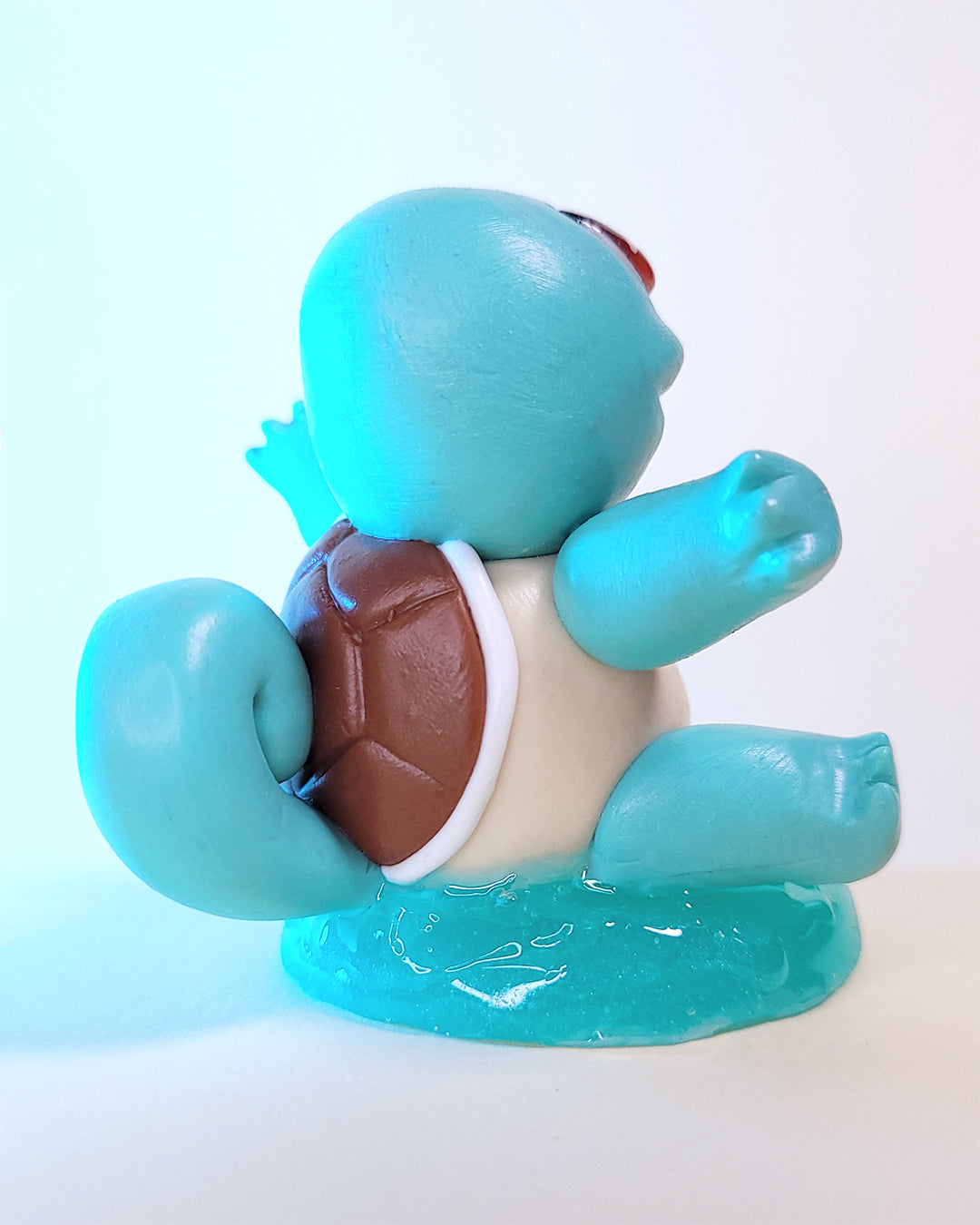 Mini figurine du Pokémon Carapuce, ressemblant à une tortue bleue turquoise